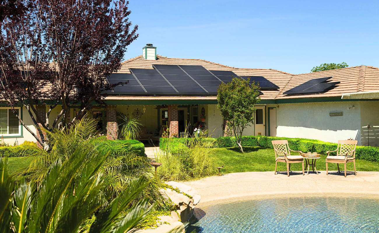 House with full black solar panels House with full black solar panels